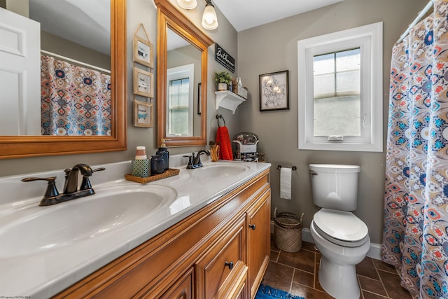 bathroom with vanity, tile patterned flooring, toilet, and a shower with shower curtain