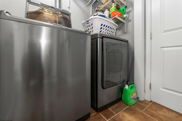 washroom with washer and clothes dryer