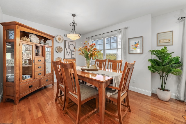 dining room featuring light wood-type flooring