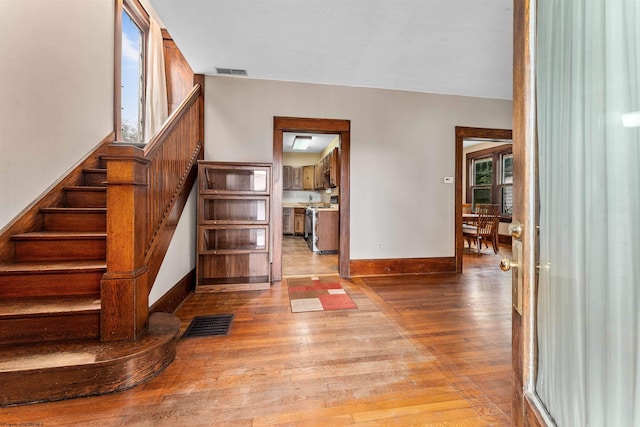 entrance foyer with light hardwood / wood-style floors