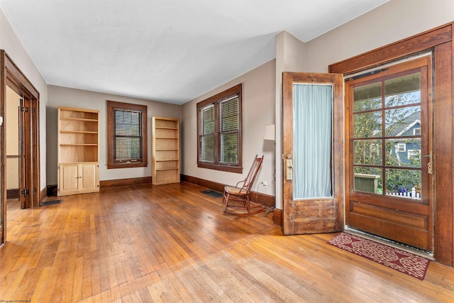 entrance foyer with hardwood / wood-style flooring