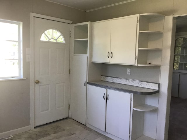 kitchen with white cabinetry