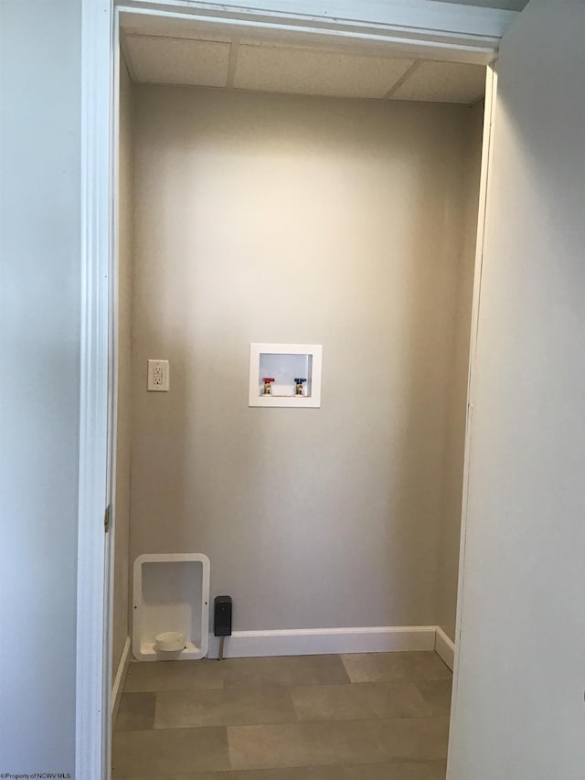 laundry room with light wood-type flooring and hookup for a washing machine