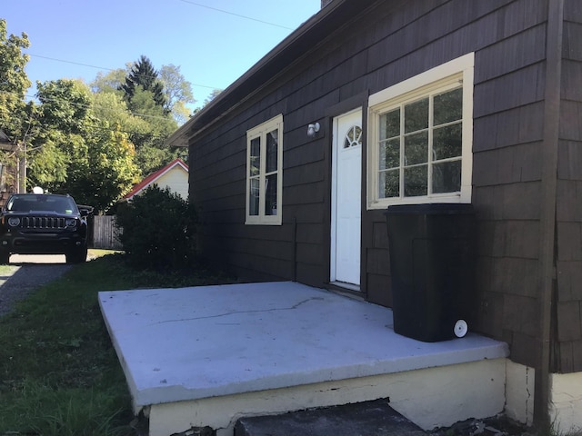 entrance to property featuring a patio area