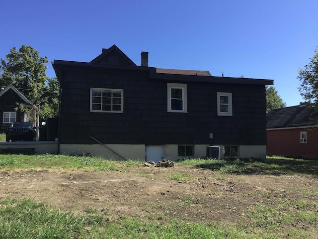 view of home's exterior featuring cooling unit