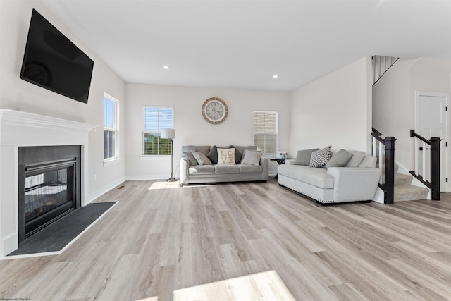 living room with light hardwood / wood-style floors