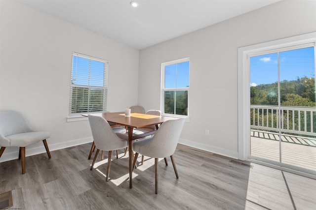 dining area with light wood-type flooring