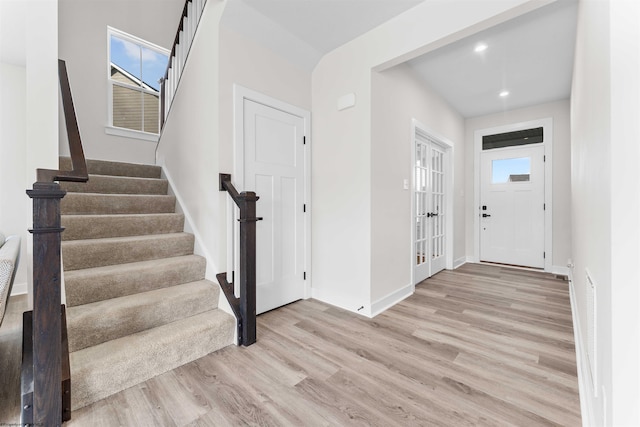 foyer entrance featuring light wood-type flooring