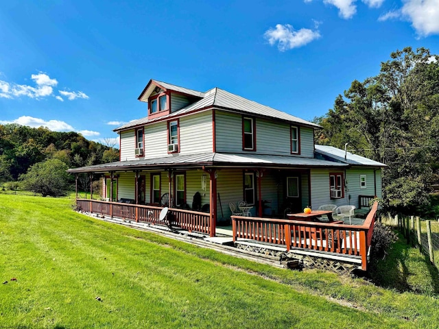 view of front of house with a front lawn and a porch