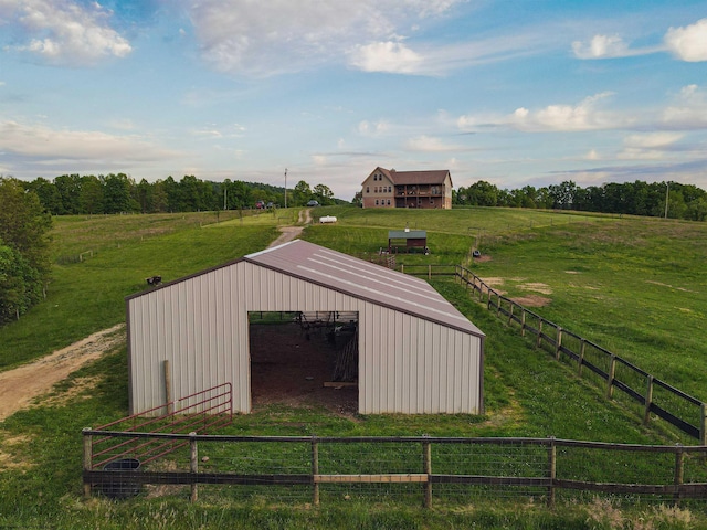 view of outbuilding with a rural view