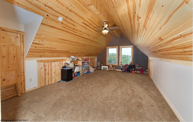 playroom with ceiling fan, vaulted ceiling, carpet, and wooden ceiling