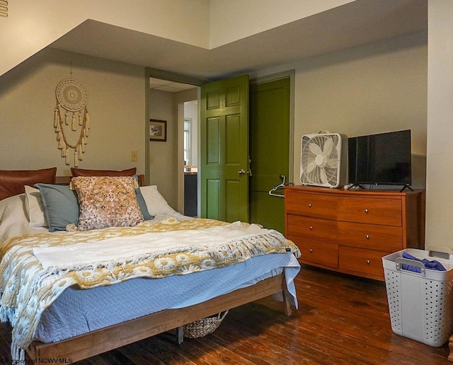 bedroom featuring dark hardwood / wood-style floors