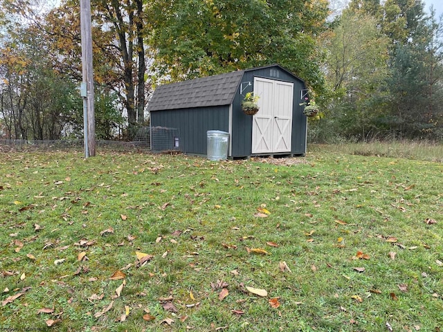 view of outdoor structure with a yard