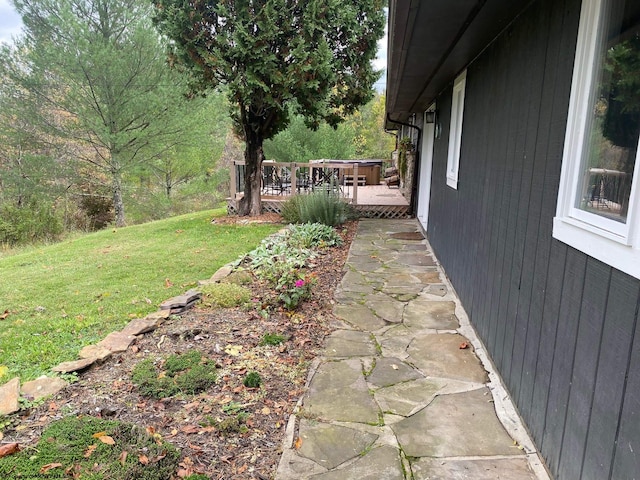 view of yard featuring a wooden deck