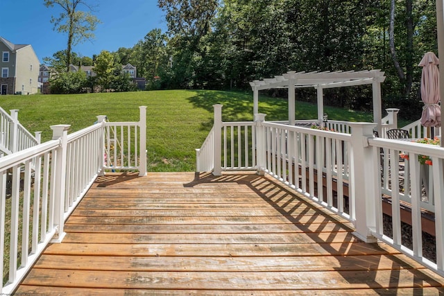 deck with a yard and a pergola