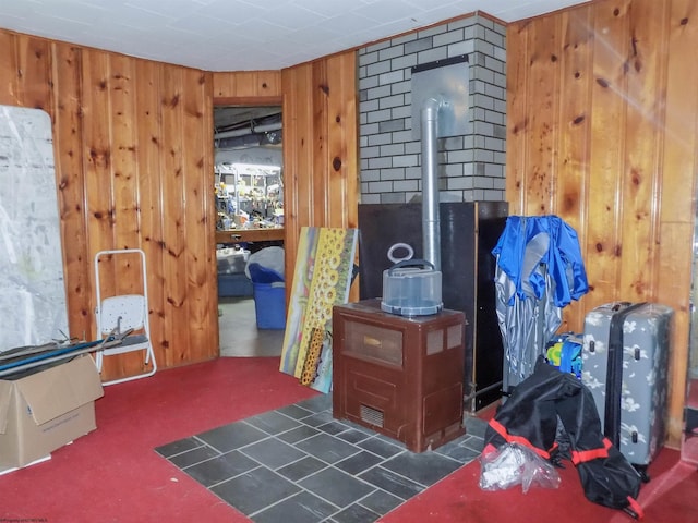 bedroom featuring wood walls