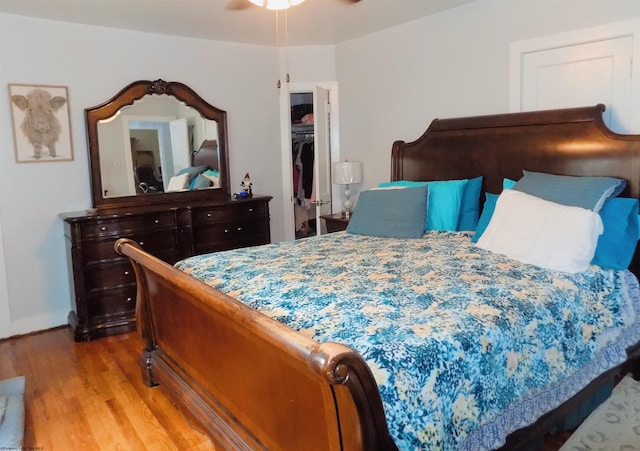 bedroom featuring a closet and light wood-type flooring