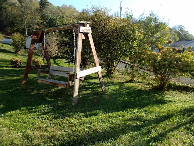 view of play area with a yard