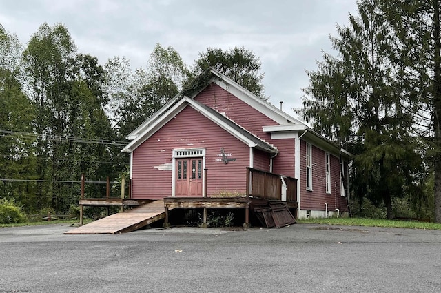 view of front of house with a deck