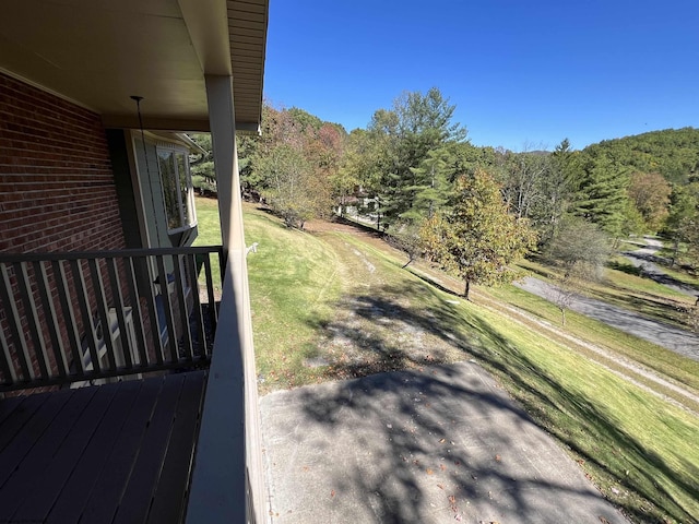 view of yard with a wooded view