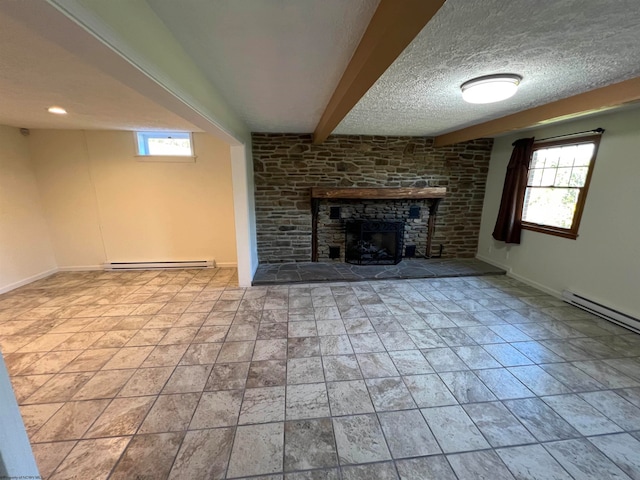 unfurnished living room featuring a stone fireplace, beamed ceiling, a textured ceiling, and a baseboard radiator