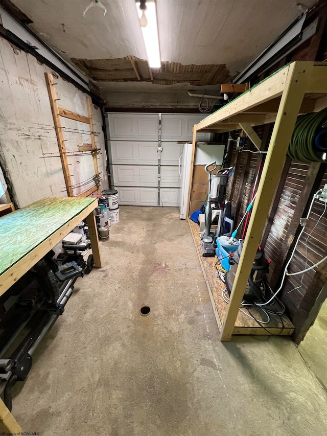 garage with white refrigerator