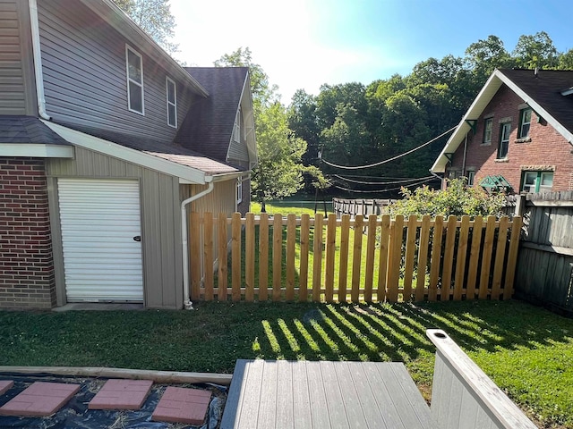 view of yard featuring a garage