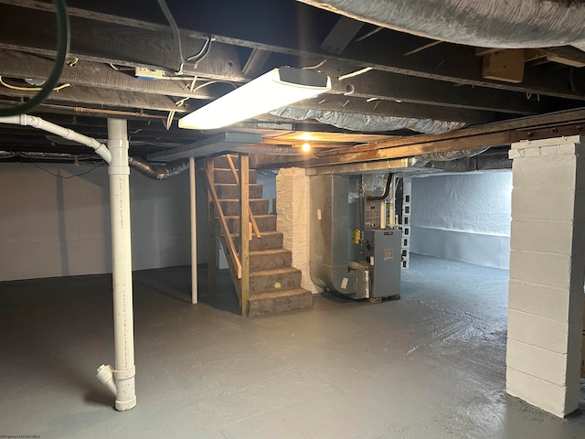 basement featuring heating unit