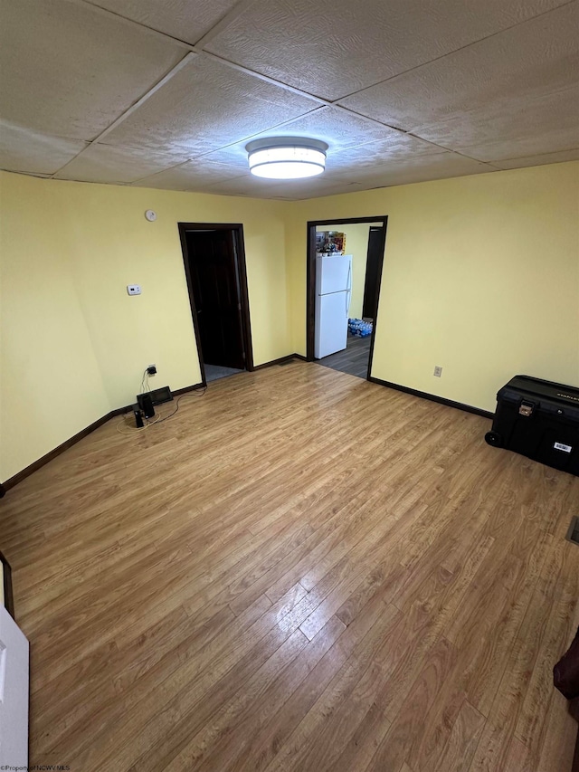 unfurnished room featuring hardwood / wood-style floors