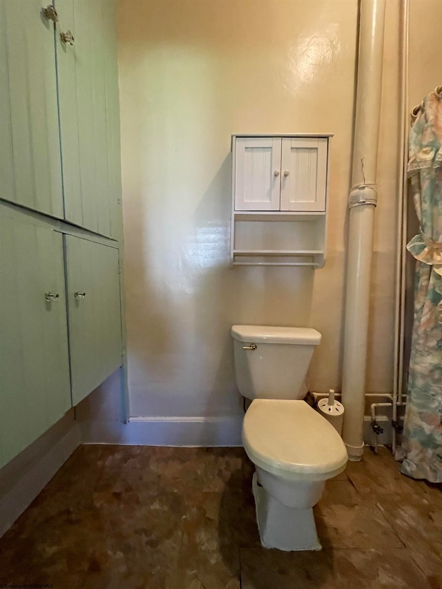 bathroom featuring toilet