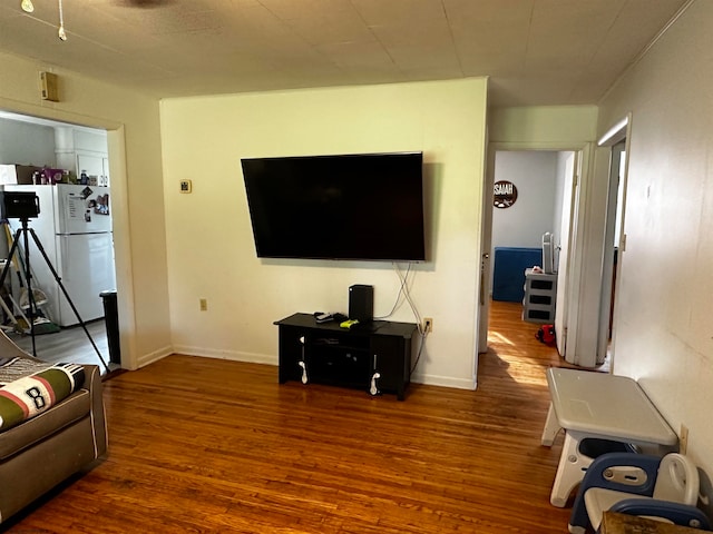 living room with dark wood-type flooring