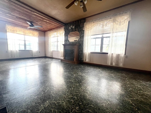 unfurnished living room with ceiling fan