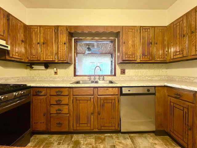 kitchen featuring extractor fan, black range with gas stovetop, sink, and stainless steel dishwasher