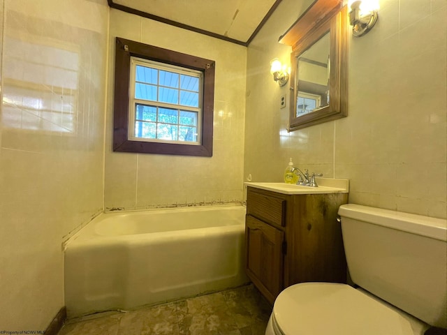 bathroom featuring a tub to relax in, vanity, and toilet