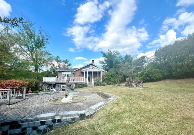 view of yard featuring a deck