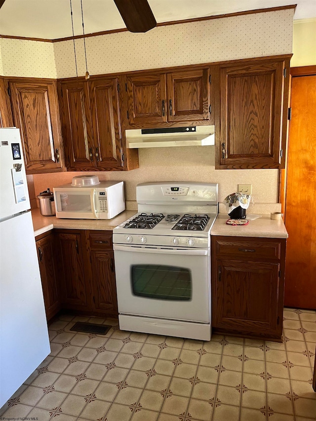 kitchen featuring white appliances