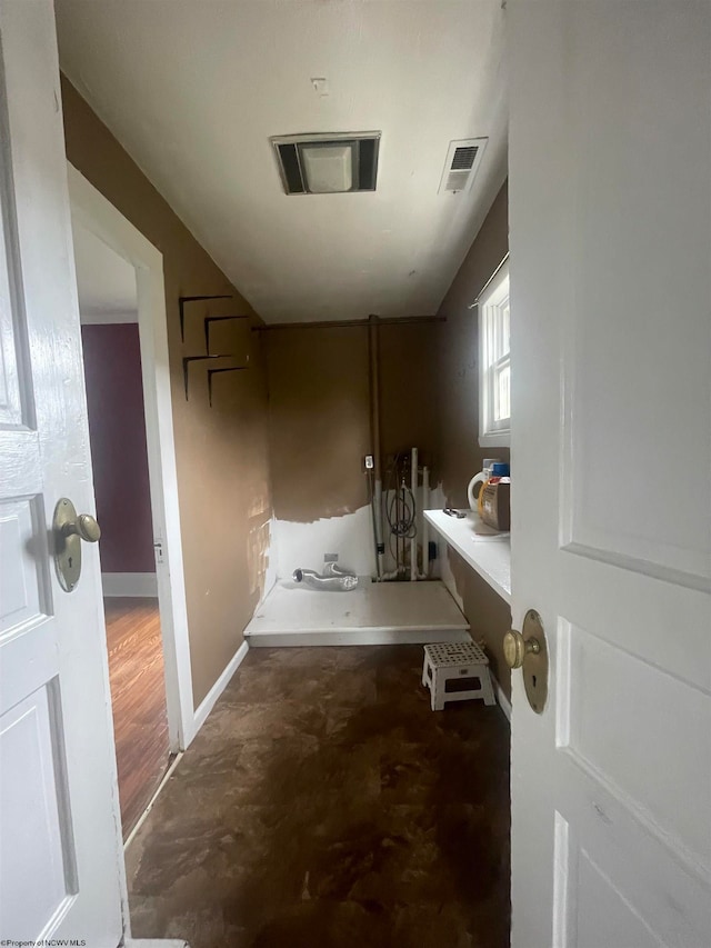 bathroom with concrete flooring