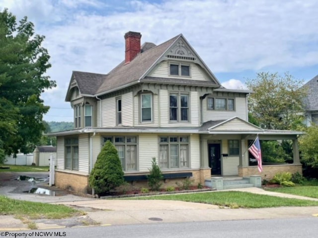 victorian home featuring a porch