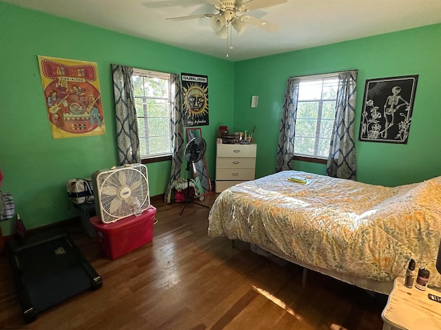 bedroom featuring hardwood / wood-style floors and ceiling fan