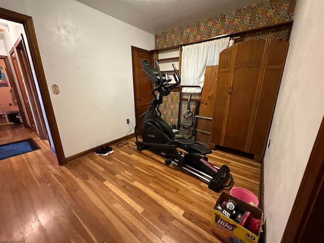 exercise area with hardwood / wood-style floors