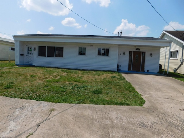 ranch-style home with a front lawn