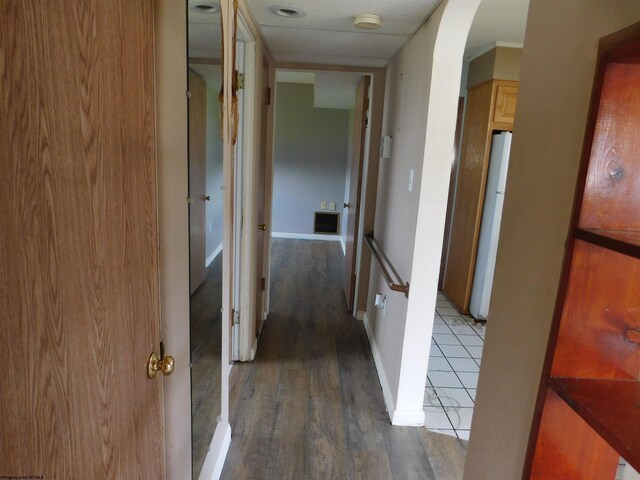 115 Ullom St, Fairmont, WV 26554 - corridor with arched walkways, wood finished floors, and baseboards