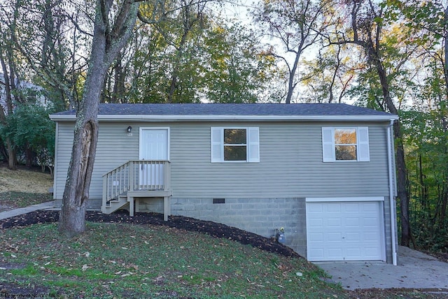 view of front of home with a garage