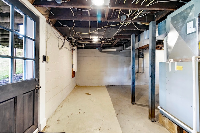 basement featuring heating unit