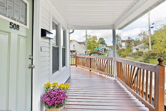 wooden deck featuring a porch