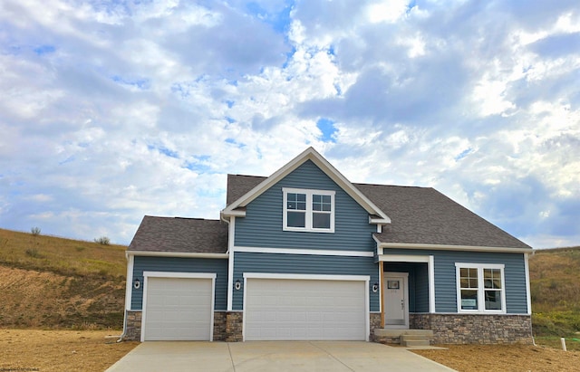 craftsman-style house featuring a garage