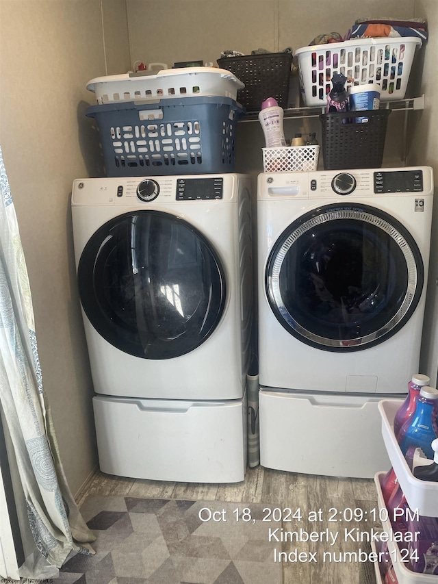 washroom featuring separate washer and dryer