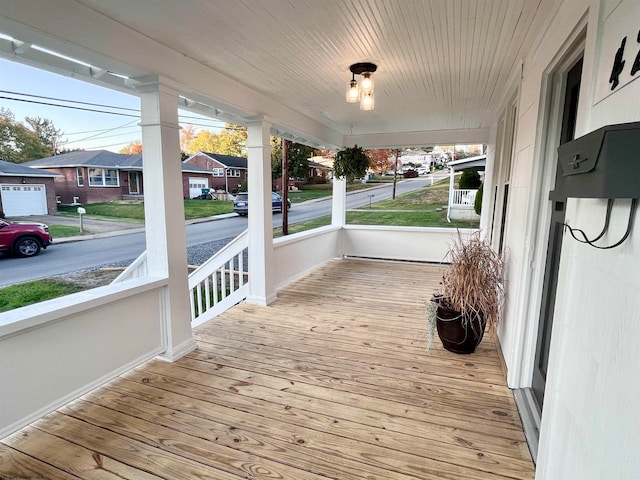 wooden deck featuring covered porch