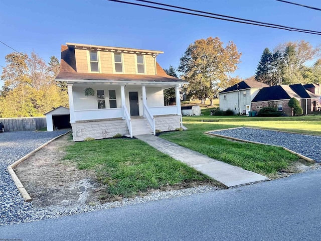 428 James St, Bridgeport, WV 26330 - bungalow featuring an outbuilding, stone siding, a porch, and a front yard