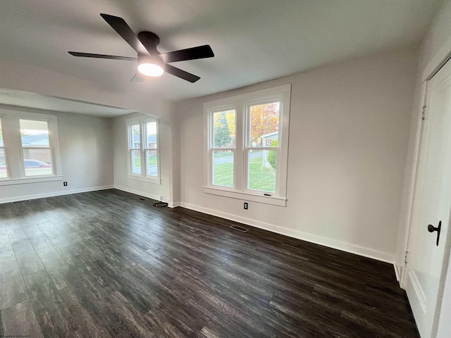 428 James St, Bridgeport, WV 26330 - spare room featuring ceiling fan, dark wood-style floors, and baseboards